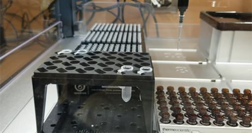 Robotic liquid handler in research laboratory