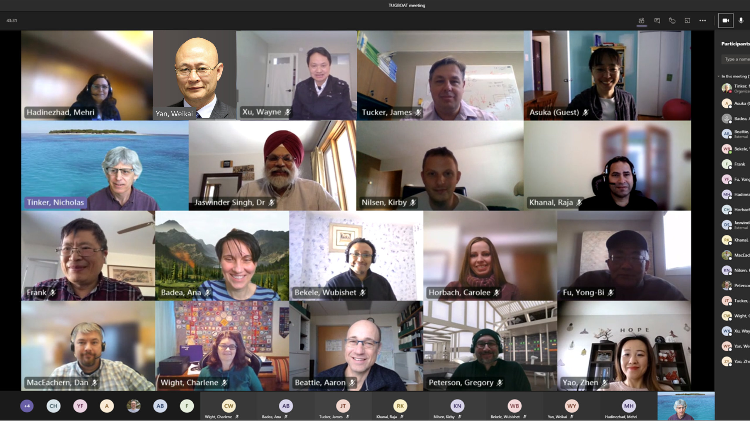 A photo of 19 of the team members in individual boxes as they attend a virtual meeting.