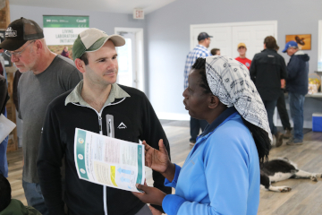 Dr. Nyiraneza speaks with another living lab participant.